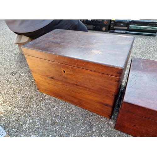 1107 - A mahogany writing slope; together with a walnut writing slope; and one other box.