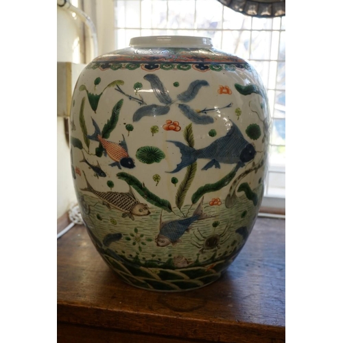 1778 - A good and large pair of Chinese famille verte jars and covers, 19th century, painted with fish, 35.... 