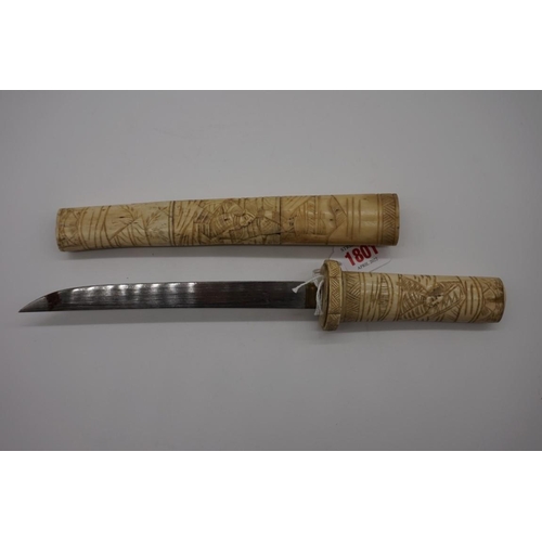 1801 - Two Japanese carved bone tanto daggers and sheaths. (2)