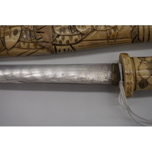 1801 - Two Japanese carved bone tanto daggers and sheaths. (2)