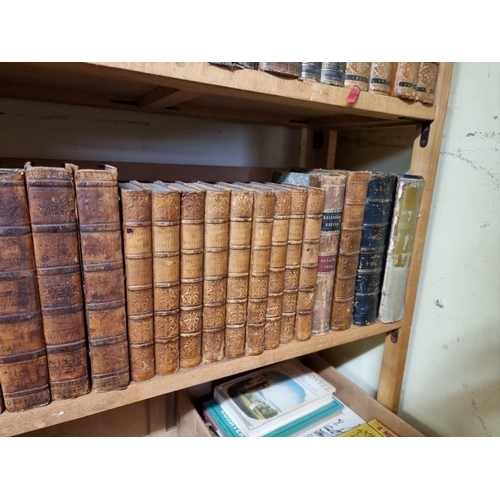 94 - ANTIQUARIAN: a quantity of antiquarian books over 5 shelves, the majority calf bound, approx 11... 