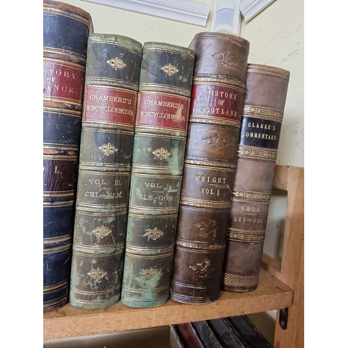 94 - ANTIQUARIAN: a quantity of antiquarian books over 5 shelves, the majority calf bound, approx 11... 