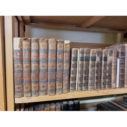 94 - ANTIQUARIAN: a quantity of antiquarian books over 5 shelves, the majority calf bound, approx 11... 