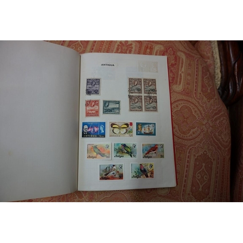 1803 - Stamps: an album of GB, Victoria and later; together with three further mixed world albums; a folder... 