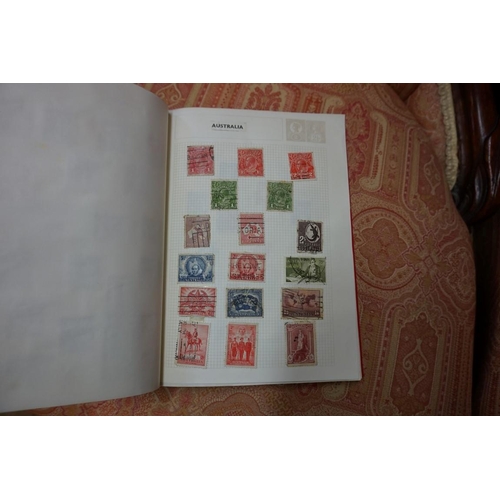 1803 - Stamps: an album of GB, Victoria and later; together with three further mixed world albums; a folder... 