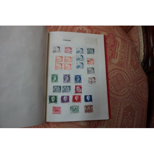 1803 - Stamps: an album of GB, Victoria and later; together with three further mixed world albums; a folder... 