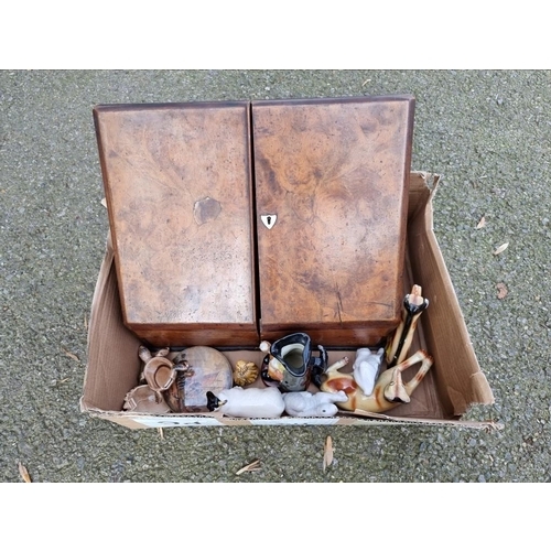 1070a - An antique walnut stationary cabinet, together with sundry ceramics.