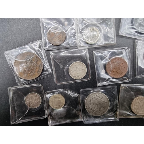 849 - Coins: a group of Russian Empire and Soviet era coins, to include the following silver examples: a 1... 