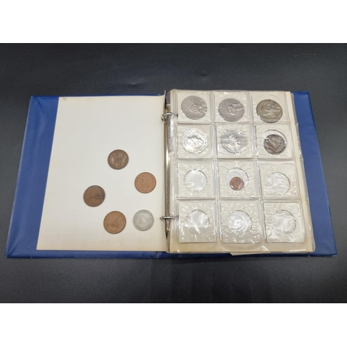 861 - Coins: an album of UK and world coins, to include a George V 1935 rocking horse crown.... 