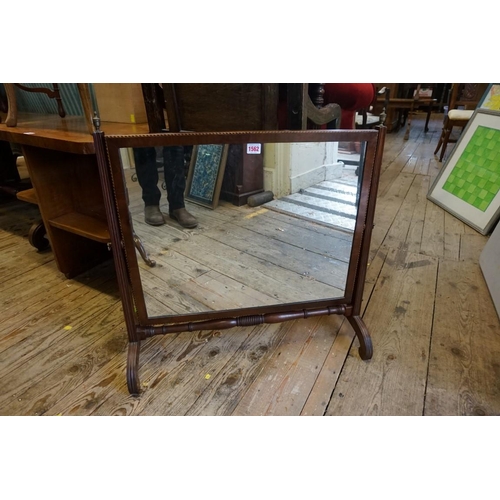 1408 - A large antique mahogany and chequer strung skeleton toilet mirror, 68cm wide.