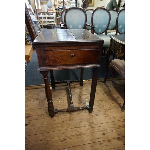 1423 - An unusual late 17th/early 18th century oak side table, with a lateral frieze drawer, 63cm wide.... 