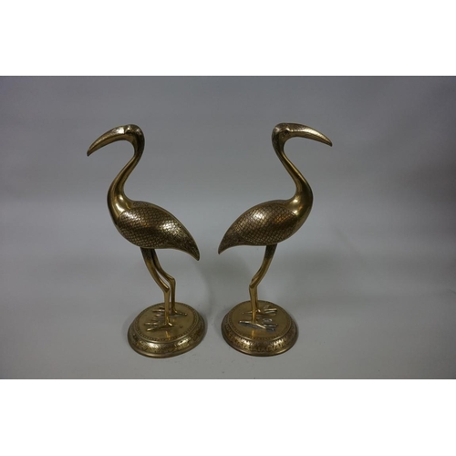 1549 - A large pair of Eastern brass cranes, 37cm high.