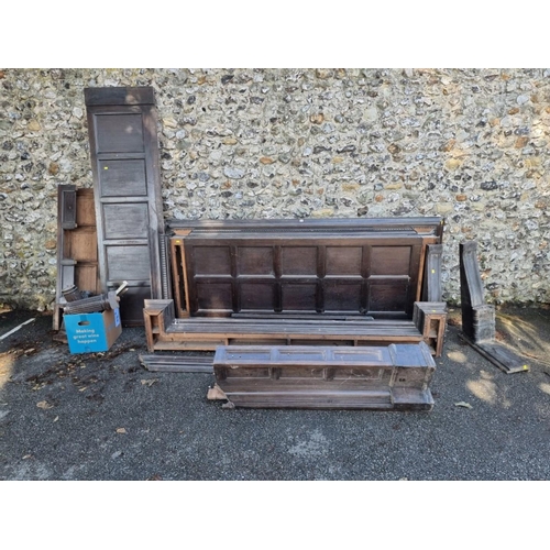 1034 - An antique oak canopy, carved 'A Warm Welcome', 258cm wide; together with various oak supports,... 