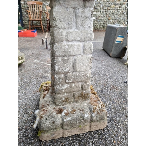 1047 - A reconstituted stone bird bath, 75cm high. ... 