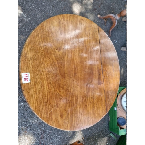 1107 - A Victorian mahogany tripod table, 73cm high.