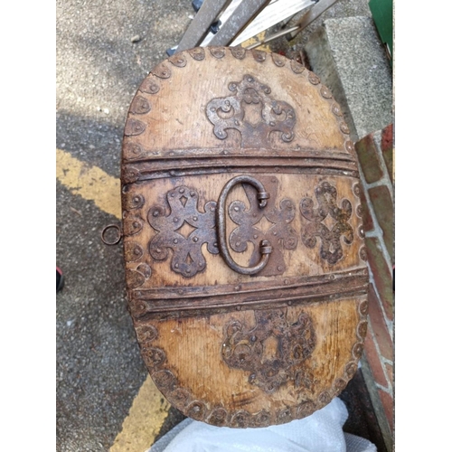 1123 - A rustic wooden metal bound box on stand, 61cm high x 57cm wide.