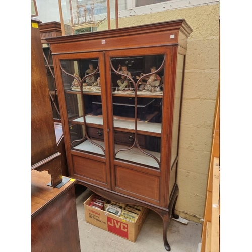 1194 - An Edwardian mahogany and inlaid display cabinet, 113cm wide.