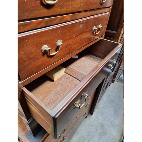 1214 - An early 20th century mahogany three drawer chest, with brushing slide, 73cm wide.