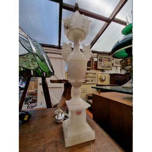 1231 - An alabaster table lamp, height excluding fitting 55cm.