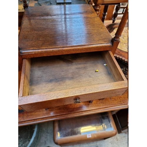 1259 - A late Georgian mahogany shaving stand, 35.5cm wide.