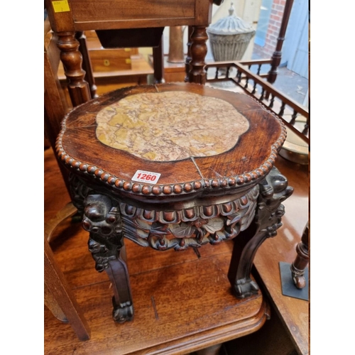 1260 - A Chinese carved hardwood and marble inset low table or jardiniere stand, 39cm high. ... 