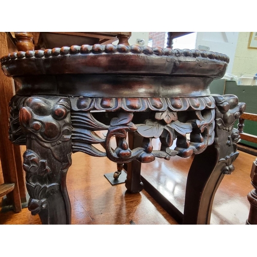 1260 - A Chinese carved hardwood and marble inset low table or jardiniere stand, 39cm high. ... 