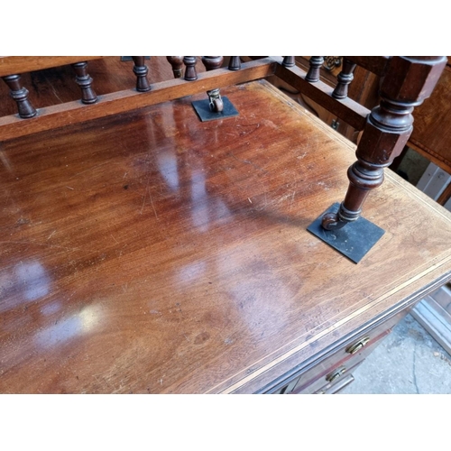 1263 - A circa 1900 mahogany and inlaid pedestal desk, 121.5cm wide. 