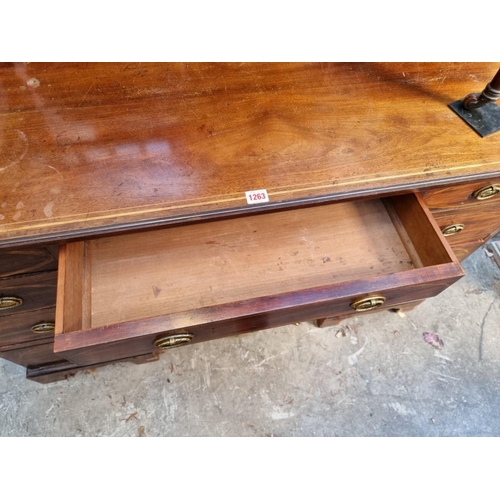 1263 - A circa 1900 mahogany and inlaid pedestal desk, 121.5cm wide. 