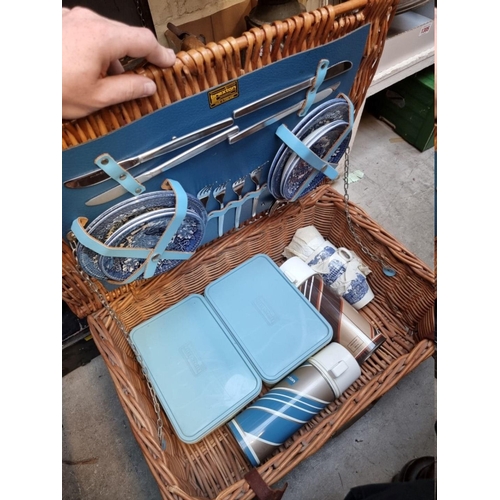 1310 - A vintage Brexton picnic hamper. 