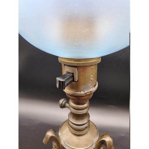 1316 - A WAS Benson brass and blue vaseline glass tripod table lamp, 45cm high.