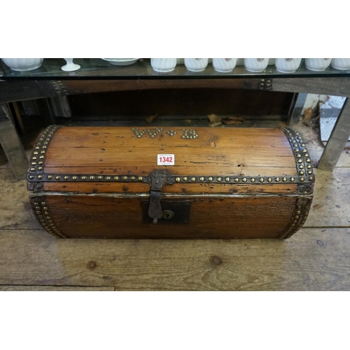 1342 - An antique bass studded dome top casket, 53cm wide.