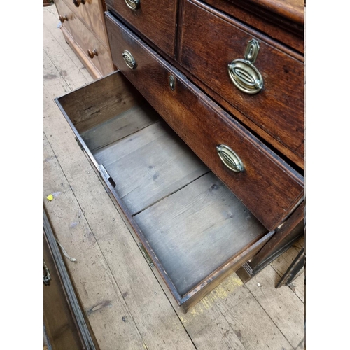 1418 - A George III oak chest of drawers, 105cm wide.