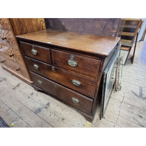 1418 - A George III oak chest of drawers, 105cm wide.