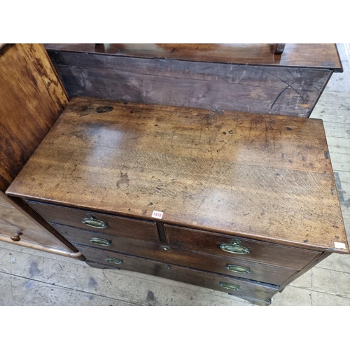 1418 - A George III oak chest of drawers, 105cm wide.