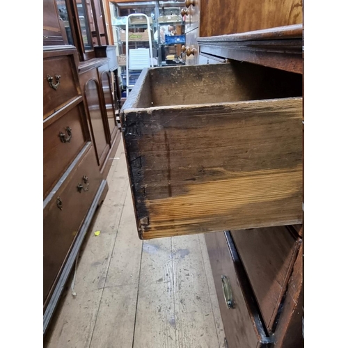 1418 - A George III oak chest of drawers, 105cm wide.