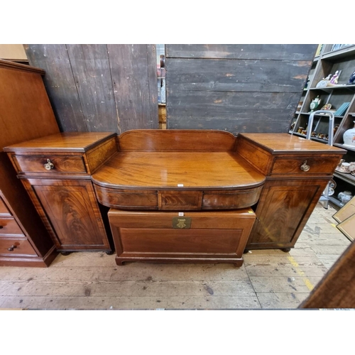 1442 - A Regency mahogany and ebony strung pedestal sideboard, with bowfront centre, 206.5cm wide.... 