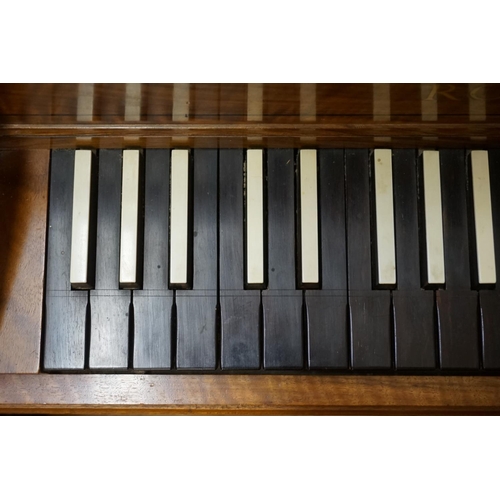 1463 - A good walnut harpsichord by Robert Goble, dated 1965, with ebony and ivory keys, 184cm x 95.5cm.DEF... 