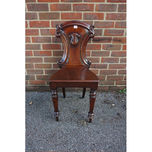 1473 - A Victorian mahogany hall chair. 