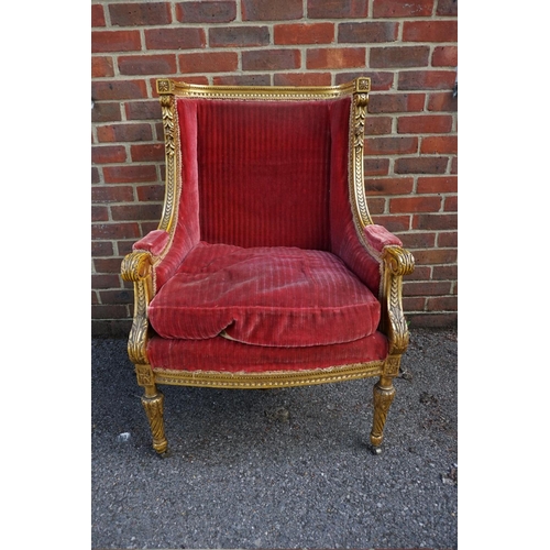 1476 - (ML) A Louis XVI style giltwood wing armchair.