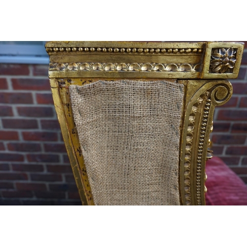 1476 - (ML) A Louis XVI style giltwood wing armchair.