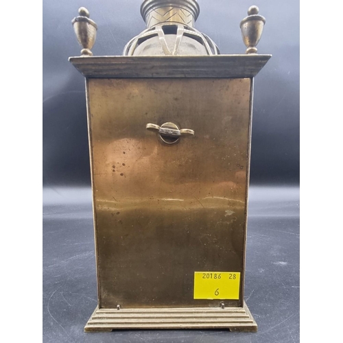 1496 - An old brass mantel clock, with engraved decoration, 21.5cm high.