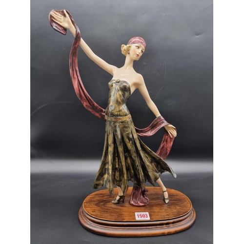 1503 - A resin figure of an Art Deco lady, 45.5cm high. 