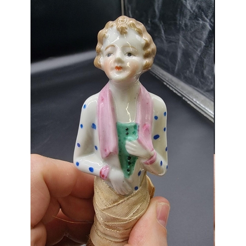 1537 - A Royal Doulton figure of 'Loretta', HN2337; and two vintage porcelain half dolls. ... 