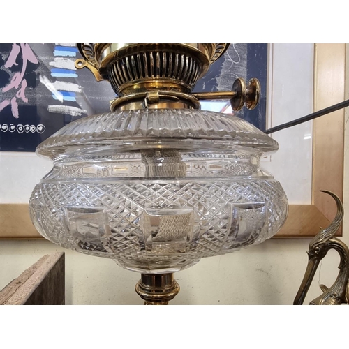 1563 - A good antique brass and cut glass oil lamp, 45cm high.