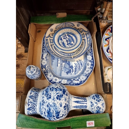 1571 - A collection of blue and white pottery and porcelain, to include a Victorian meat plate, 42.5cm... 