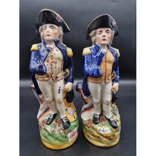 1581 - Two Victorian Staffordshire pottery Horatio Nelson commemorative jugs, largest 30cm high. ... 