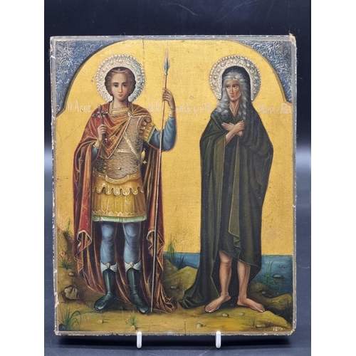 1642 - An old Russian icon of two saints, finely painted and inscribed, 26 x 21cm. ... 