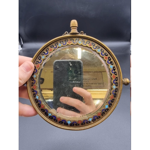 1648 - A continental gilt brass and champleve enamel circular mirror, 13.5cm diameter.