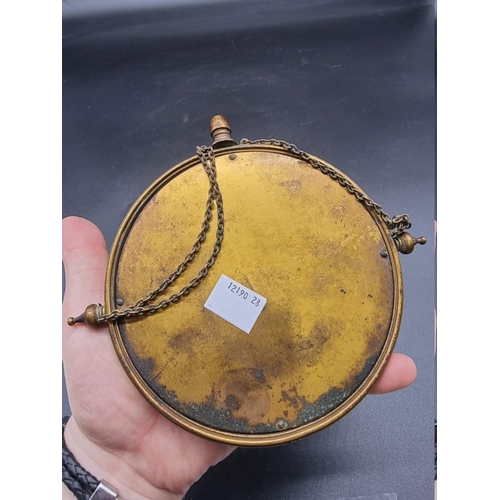 1648 - A continental gilt brass and champleve enamel circular mirror, 13.5cm diameter.