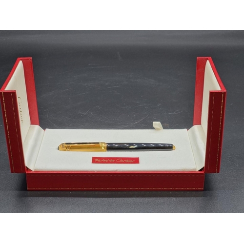 1660 - A Pasha de Cartier fountain pen, with 18k nib, boxed and with certificate, etc.